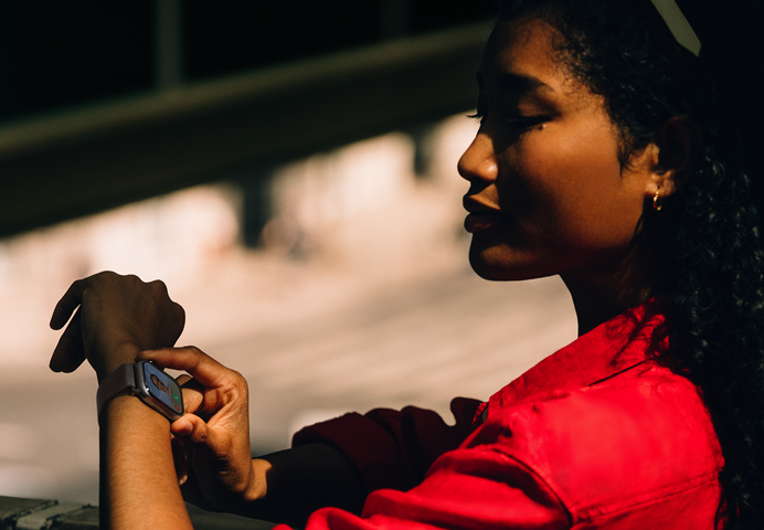 A person receives an incoming phone call on their Apple Watch Series 11