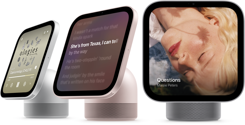 Apple HomeView, three devices all displaying Apple Music app album artwork and lyrics, from left to right, silver color, side exterior, rose pink color, side exterior, space gray color, front exterior